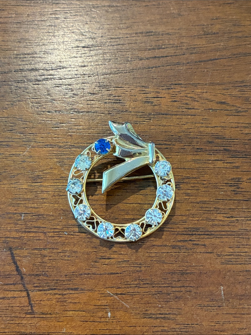 Gold-tone Circle Brooch with Clear and Blue Rhinestone Crystals